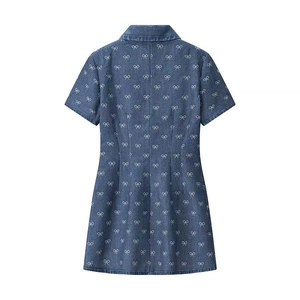 Short sleeve denim dress with bow print and collar design shown from the back view