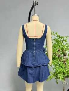 Deep blue sleeveless denim dress featuring a back silver zipper and tiered ruffle hem