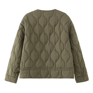 Detail view of the back of a green onion-quilted jacket with high-quality stitching