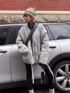 Women's light grey wave quilted puffer jacket with retro drop shoulders and standing collar
