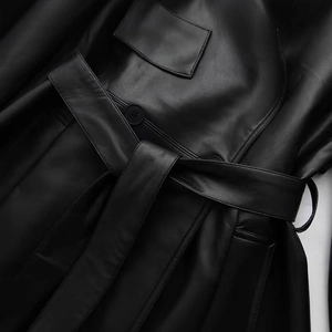 Women's black faux leather short trench coat with waist tie and front pocket detail