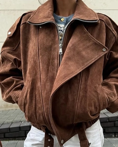 Close-up of brown suede oversized jacket with vintage collar and silver zipper detail