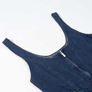 Detail of dark blue denim dress with square neck and metallic front zipper closure