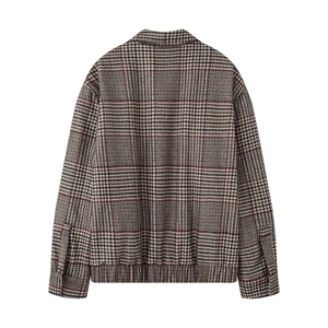 Rear view of a classic plaid bomber jacket with houndstooth texture and elastic hem