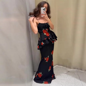 Elegant floral maxi dress with red roses, spaghetti straps, and tiered ruffle waist