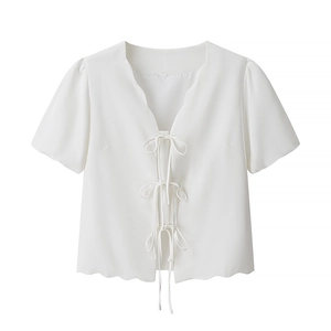 Short sleeve white crop top with scalloped edges and tie front bow details for women