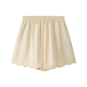 Women's apricot high-waisted A-line shorts with elastic waist and ruffled edges
