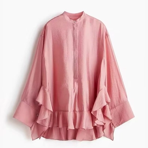 Elegant pink silk-like ruffle shirt with long batwing sleeves and a stand collar