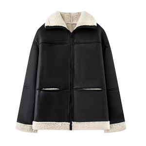 Women's black faux leather jacket with plush white shearling trim and zip-up collar