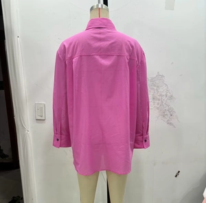 Back view of a rose pink oversized long-sleeve shirt with drop shoulder and yoke detail