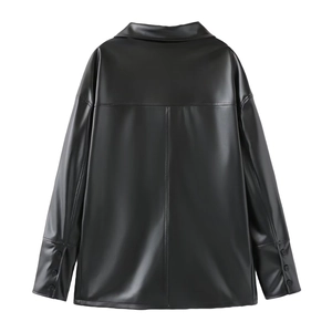 Back view of black faux leather jacket showing shoulder seams and sleeve button details