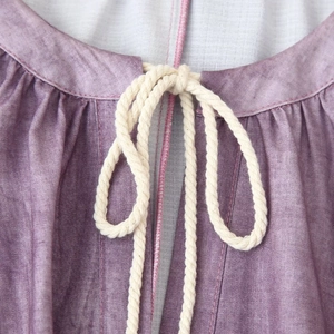 Linen blend tie-dye dress featuring a drawstring neckline with rustic woven ties and gathers