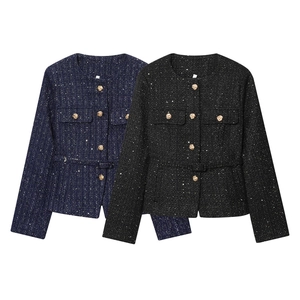 Flat lay of tweed jackets in navy and black featuring sequins and gold buttons