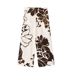 Women's white wide-leg trousers with brown floral print and vintage linen texture