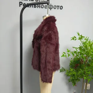 Close-up of wine red faux fur coat showing soft texture and glossy synthetic fur finish