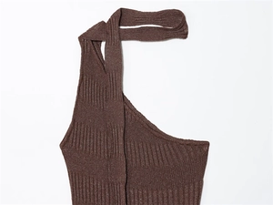 Detail of dark brown ribbed knit top with metallic glitter finish and asymmetrical collar