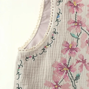 Women's cotton tank top with floral embroidery and delicate crochet lace trim details