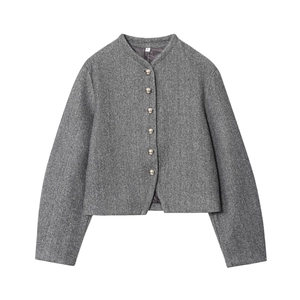 Detail of grey tweed jacket showing round neck, gold metal buttons and wool blend texture