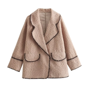 Fleece jacket with oversized collar and black decorative stitching details in beige