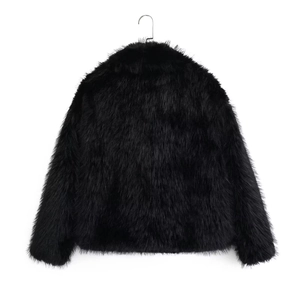 Rear view of black faux fur short jacket showcasing soft plush texture and minimalist cut
