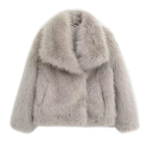 Detailed view of grey faux fur coat featuring soft texture, wide lapel, and size XS label