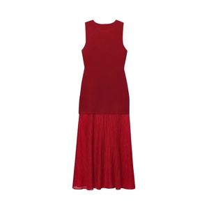 Elegant red sleeveless knit maxi dress with pleated skirt and slim fit bodice