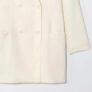 Classic cream double-breasted long blazer for women with refined tailoring and buttons