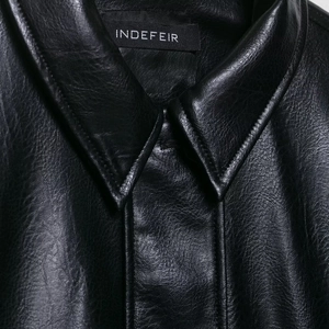 Classic black faux leather aviator jacket for women featuring a vintage lapel design