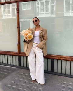 Detail of camel suede texture and oversized fit of this stylish women blazer jacket