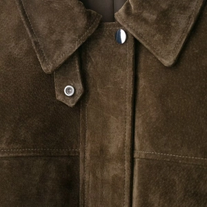 Women's dark brown suede bomber jacket featuring premium texture and silver metal buttons