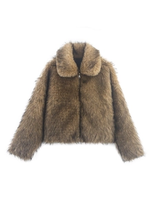 Detailed close-up of brown faux fur jacket showing shaggy texture and zipper closure