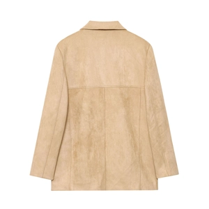 Detail view of the back seams and suede texture on a camel short jacket with lapels