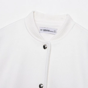 White minimalist bomber jacket with ribbed collar and polished silver buttons for women