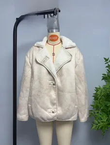 Detail view of the beige faux suede jacket showing the soft sherpa fleece collar and buttons