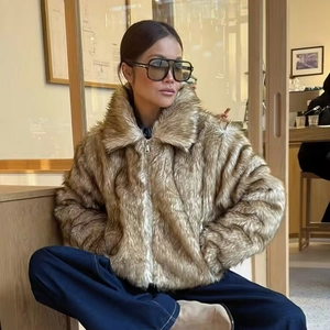 Women's faux fur short jacket in tan with plush texture and stylish wide lapels