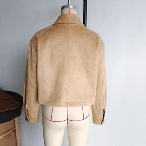 Back view of a khaki faux suede jacket with a center seam and structured tailoring