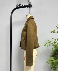 Side view of olive green faux suede cropped jacket with classic lapel and pockets