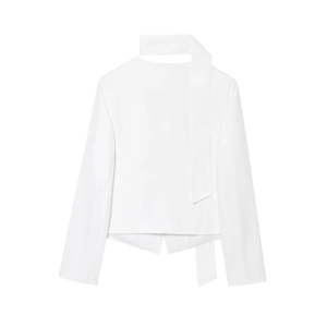 Detailed view of white long sleeve cropped blazer with elegant V-neck and tie-up scarf design