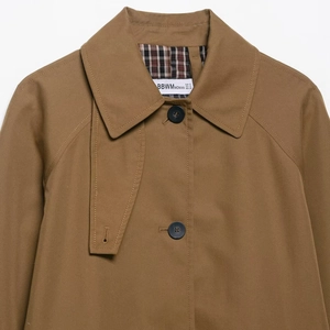 Minimalist double-sided khaki trench coat for women with classic plaid lining detail