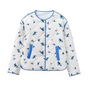 Women's floral quilted jacket with blue flower patterns and snap buttons on white background