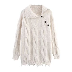 Oatmeal cable knit sweater featuring a wide lapel and side buttons with frayed hem