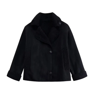 Detail of faux suede jacket featuring black faux shearling trim on collar and pockets