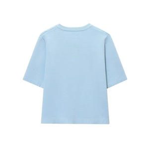 Close-up detail of light blue short sleeve knit top with ribbed crewneck and hem texture