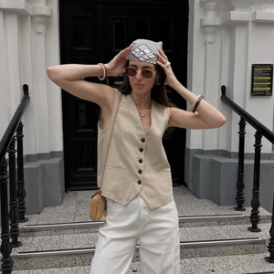 Linen blend sleeveless vest with buttons in beige, chic french minimalist style outdoor look