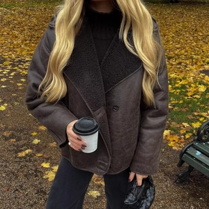 Women's dark brown faux shearling jacket with oversized collar and suede finish
