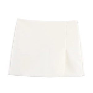 White mini wrap skort with side split design and clean woven texture for early spring