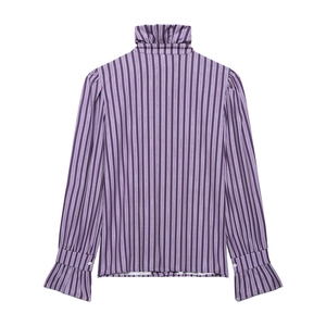 Close-up of ruffled high collar and purple striped long sleeves with flared button cuffs