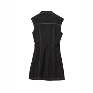 Back view of black denim sleeveless A-line dress with white contrast stitching details