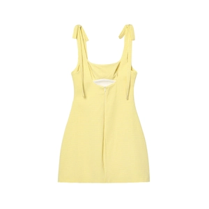 Detail of yellow gingham mini dress with shoulder bow ties and back cutout design