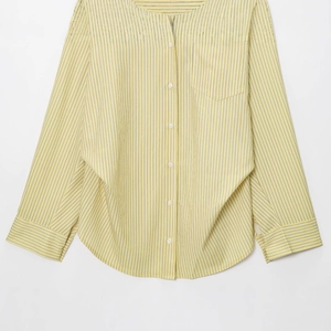 Yellow striped cotton poplin shirt with round neck, chest pocket and curved hem